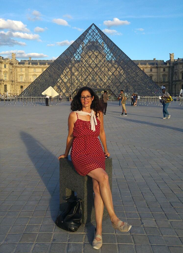 Linda in front of the Louvre in September 2016