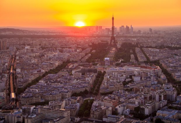 Eiffel Tower lit by sunset