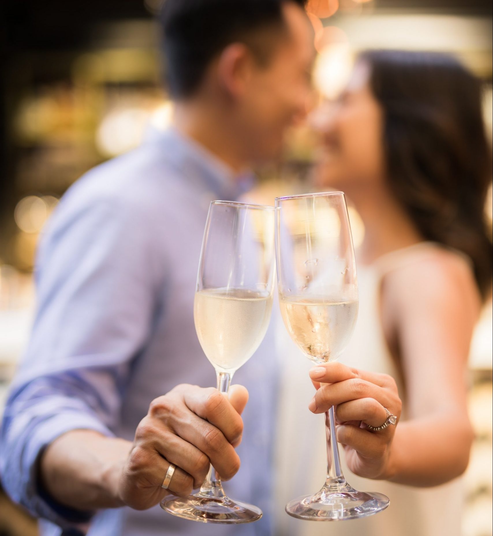 Couple in love holding champagne